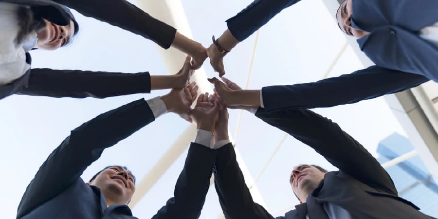 7 Ways AA Meetings Can Boost Your Self-Esteem A group of people with trust and support