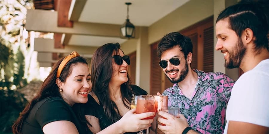 Alcohol with Friends Four friends drinking together