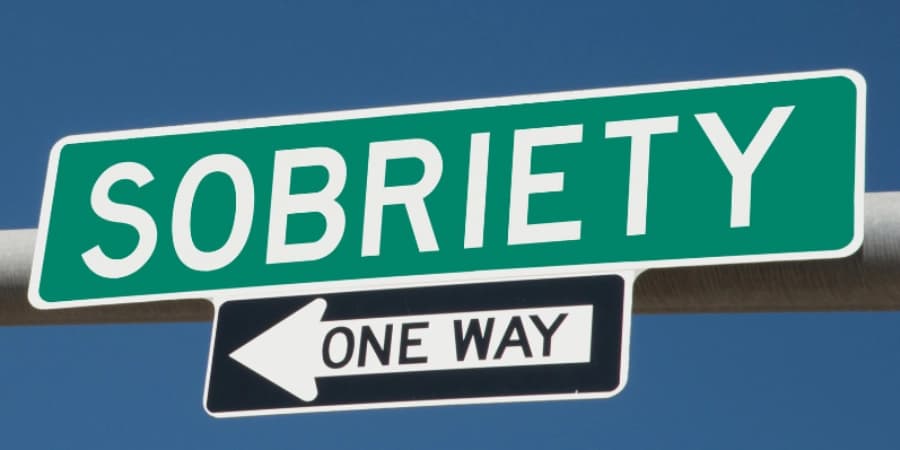 Alcoholism Recovery a street sign that states "sobriety one way" representing that alcoholism recovery and sobriety is a one way road