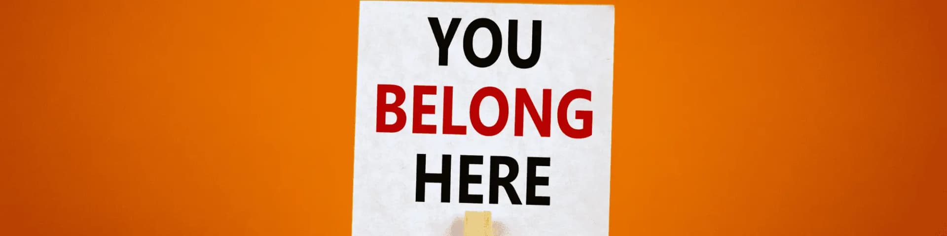 Finding Belonging in Nearby AA Meetings Phoenix Groups A picture of a sign that says "you belong here"