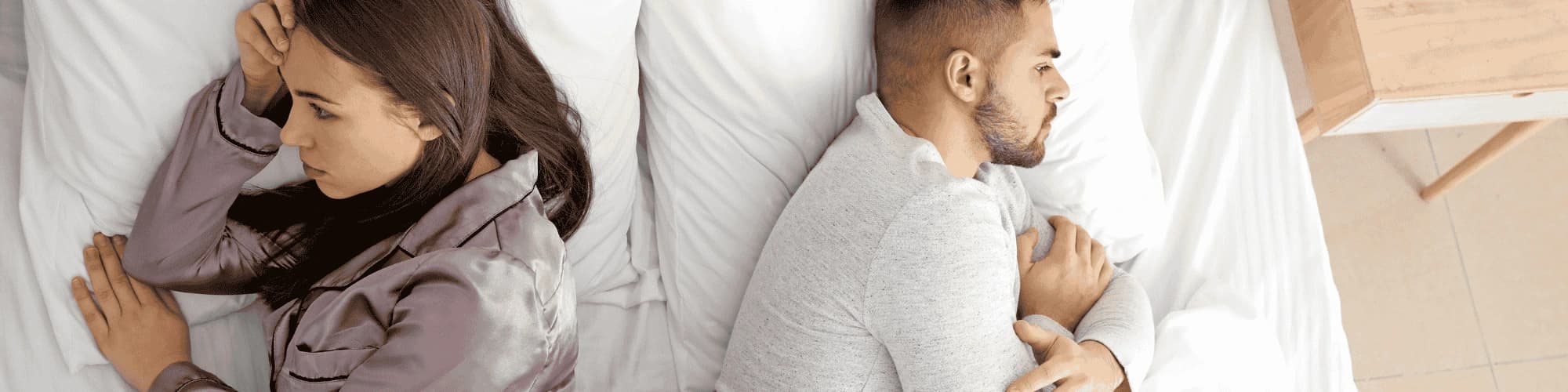 Hope and Healing: My Wife’s Battle with Alcoholism in Fresno A husband and wife turned away from each other in bed