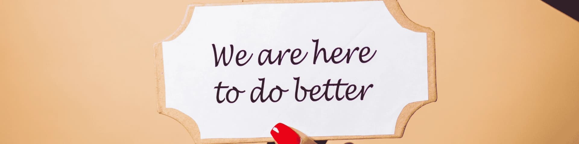 How Local AA Groups Seattle Help You Overcome Alcohol Addiction A sign that says "we are here to do better"