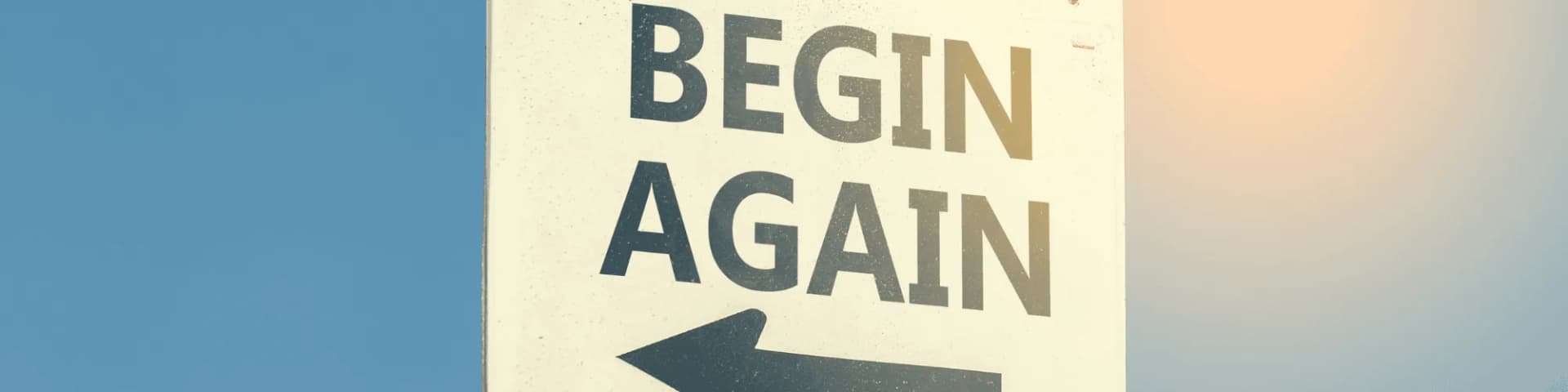 Practical Strategies for Sobriety with Nearby AA Meetings Chicago a sign pointing in a direction that says "begin again"