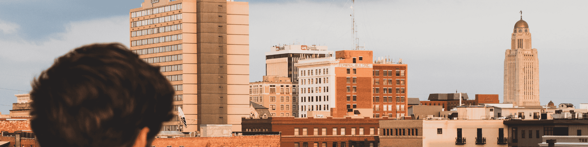 local AA meetings in Lincoln NE man looking at the city view of Lincoln NE