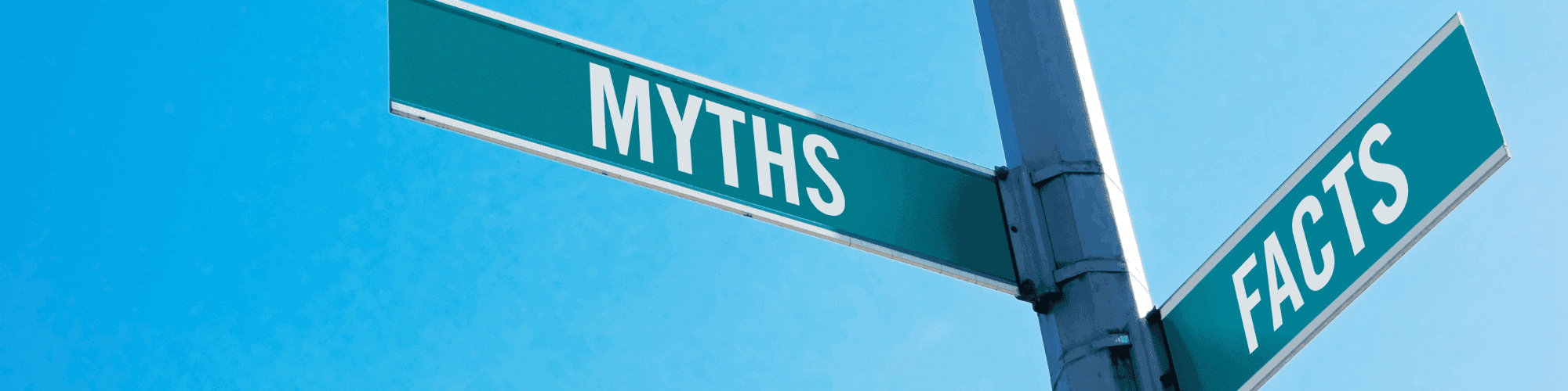 myth and facts street post sign labelled " myth and facts "