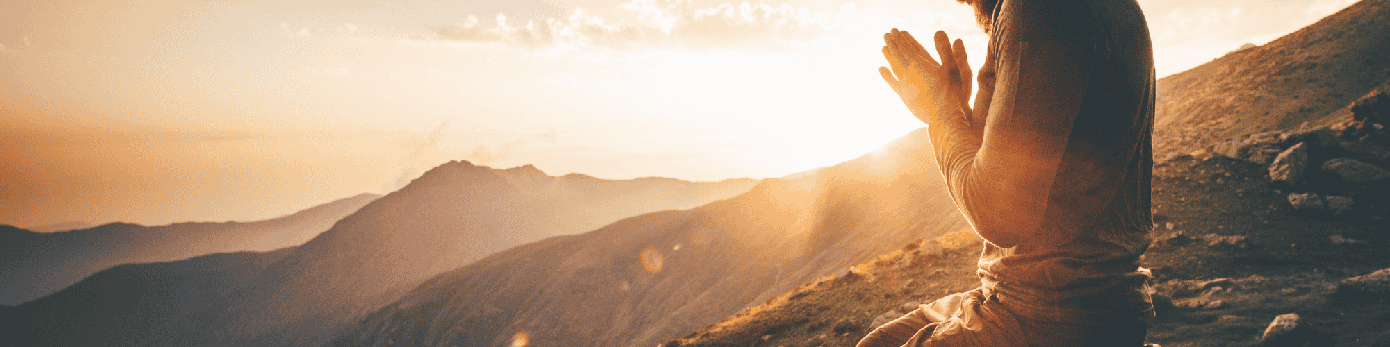 praying man a man praying in the mountain top