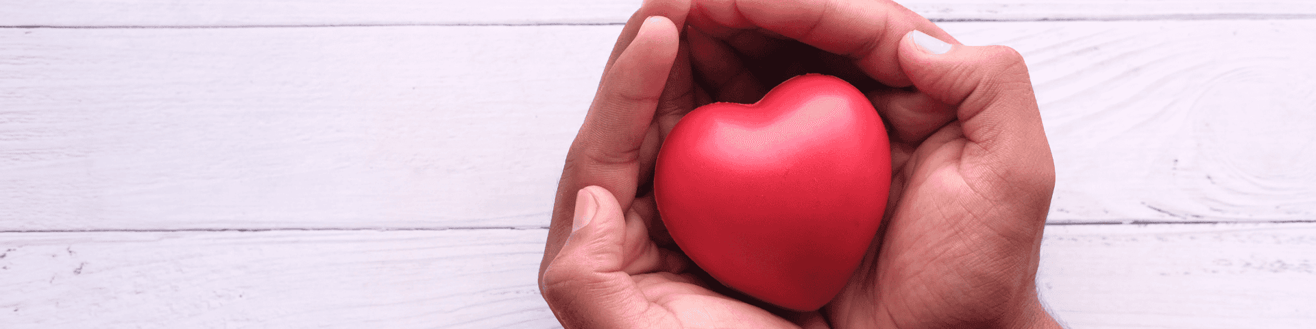 support of a love one holding a heart